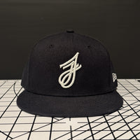 Clothing Lovers Fitted cap in wine, back view with For Those That Love Good Clothes embroidery